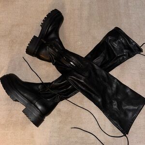 Over the knee black lug boots